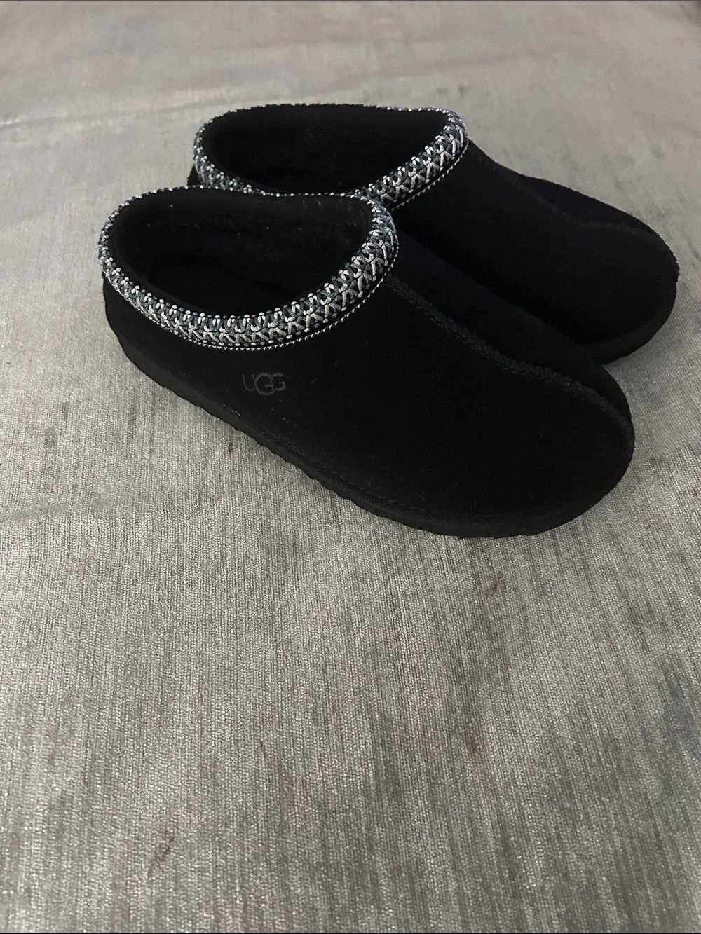 UGG Kids Black Slip-On Clogs with Silver Accent